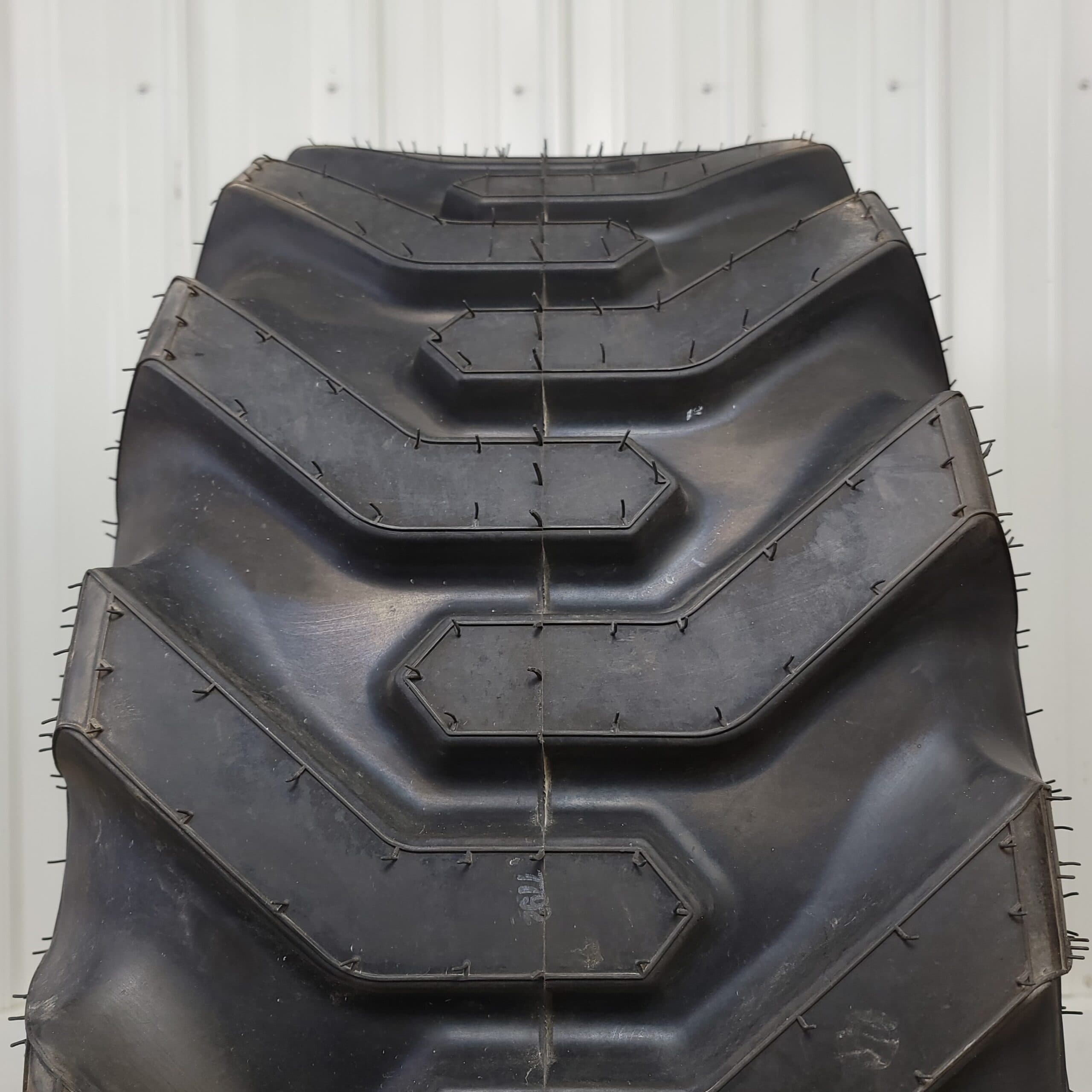 New Old Stock 15-19.5 NHS Firestone Super Traction Loader Tires in 12-Ply Rating